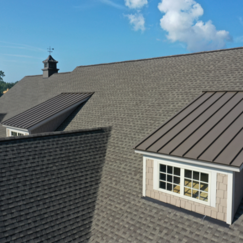 A metal and shingle roof combo