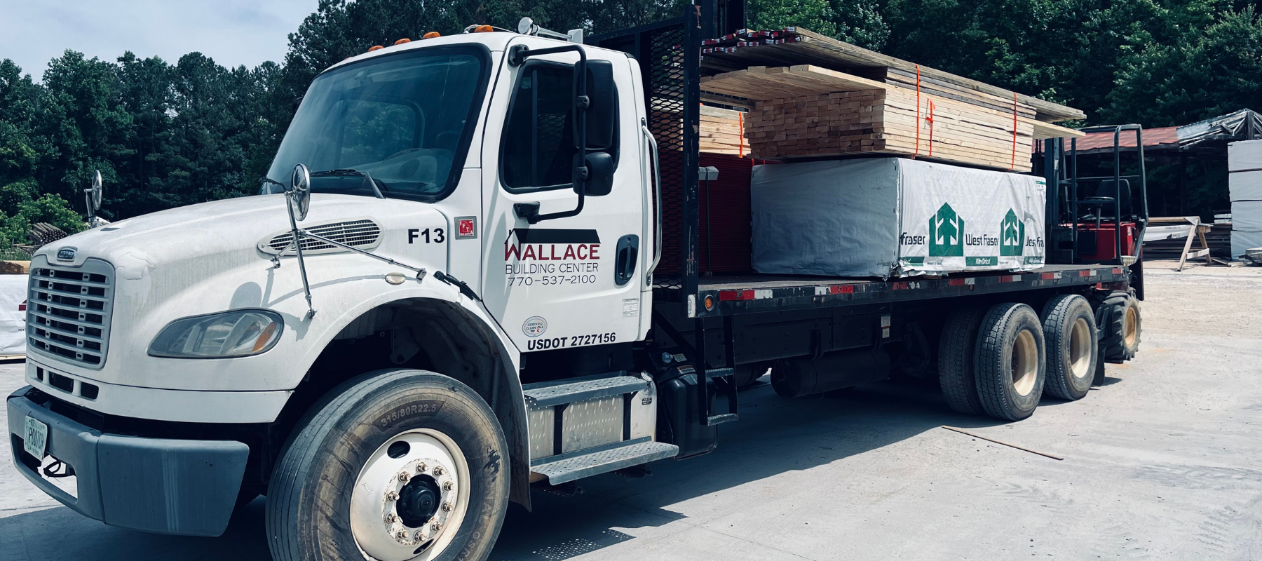 Wallace Building Center truck loaded with lumber